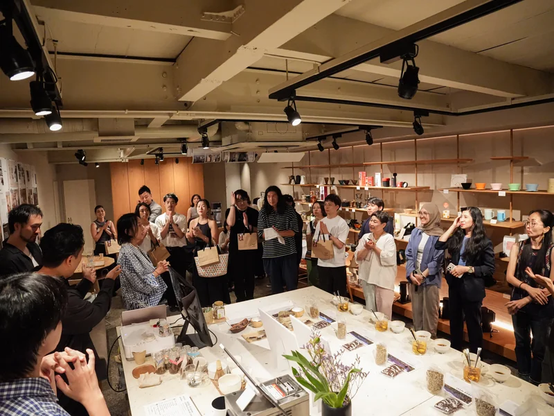 Guests and organizers gathering at Kurasu Ebisugawa in Kyoto